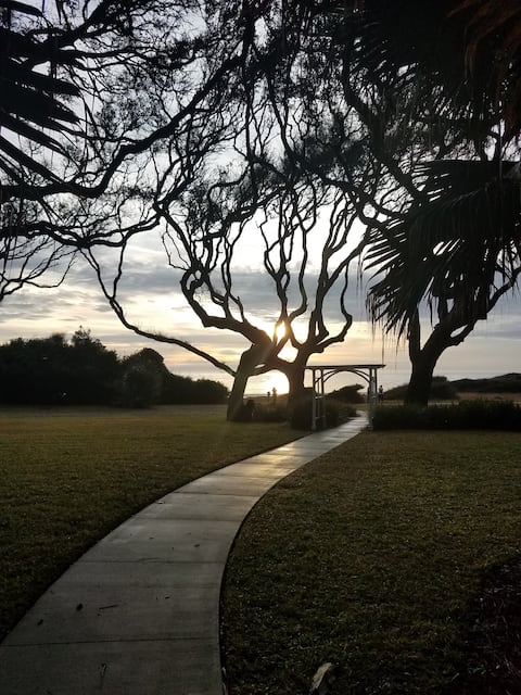 This stunning spot is across the street from our house. This path is leading from the Holiday Inn, continue on to enter the beach.